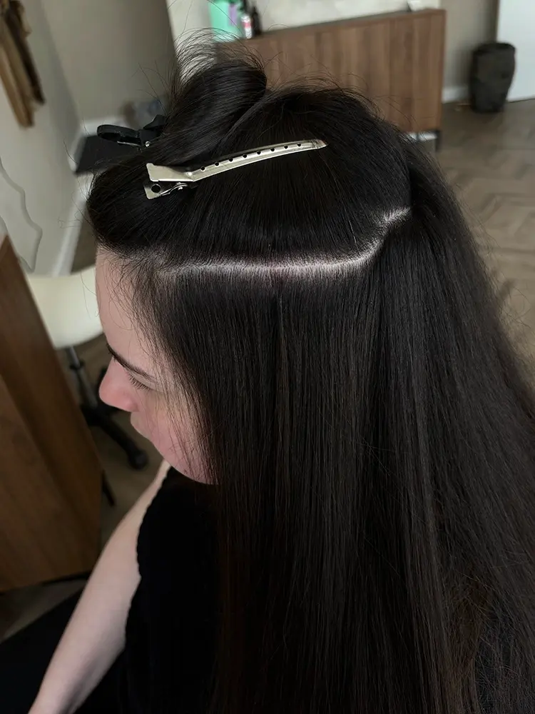 Model with beautiful micro ring hair extensions