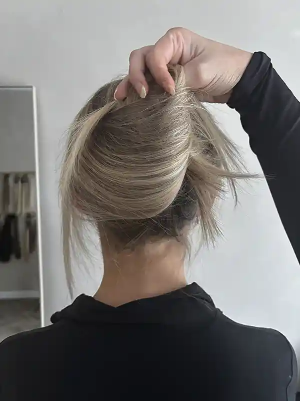 Final result with hair up in ponytail showing bonds are completely invisible