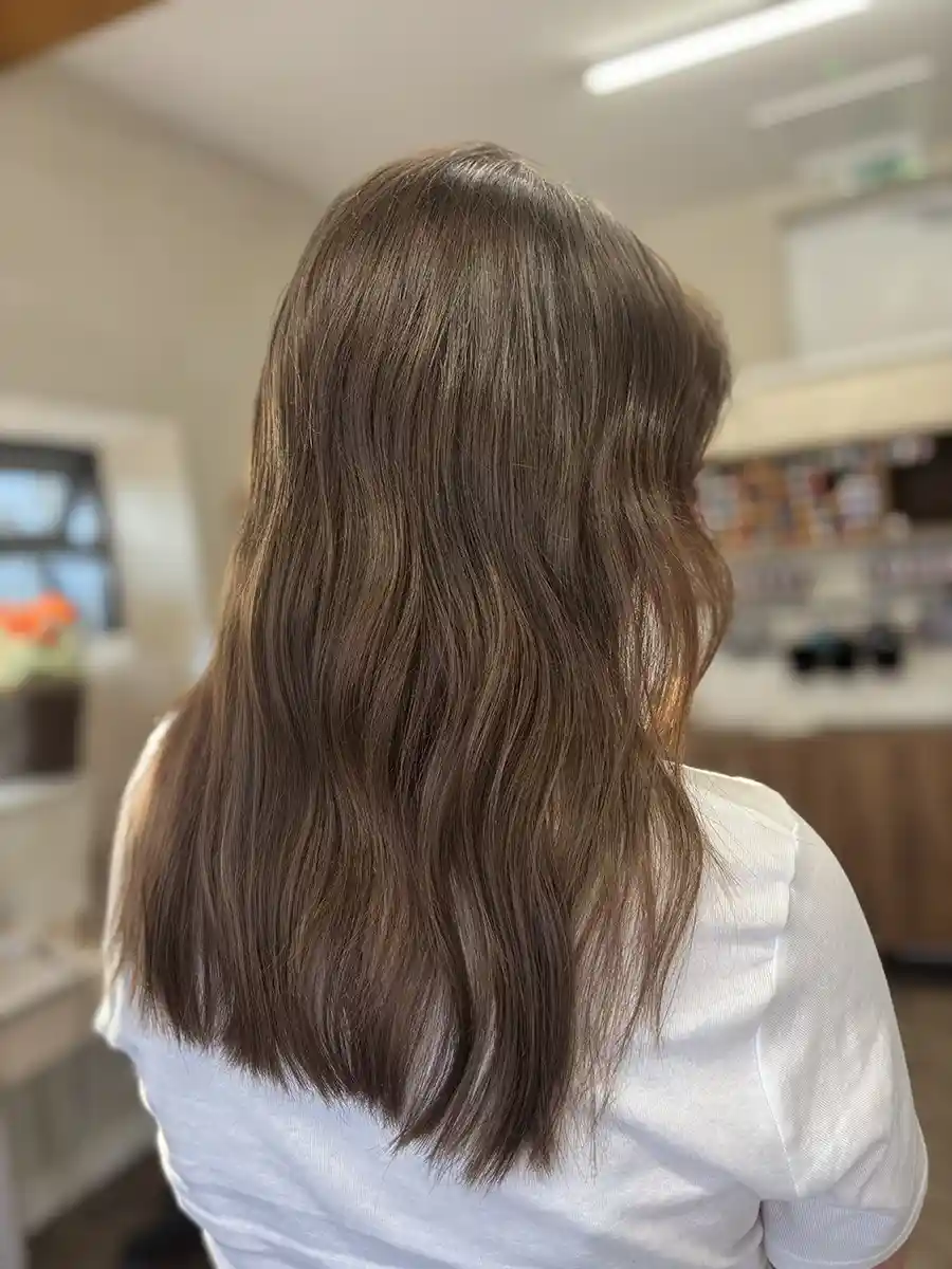 After: Full, voluminous hair transformation