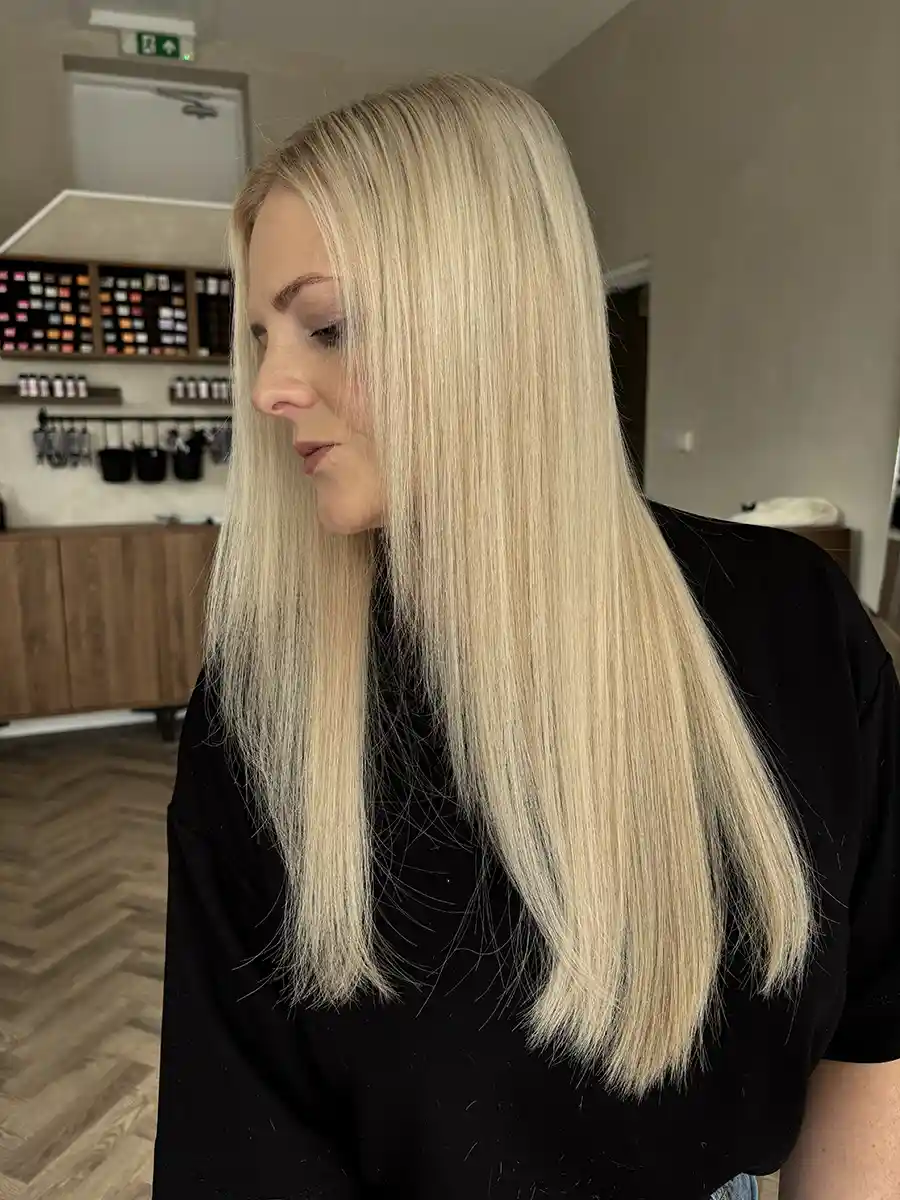 After: Long, voluminous hair transformation