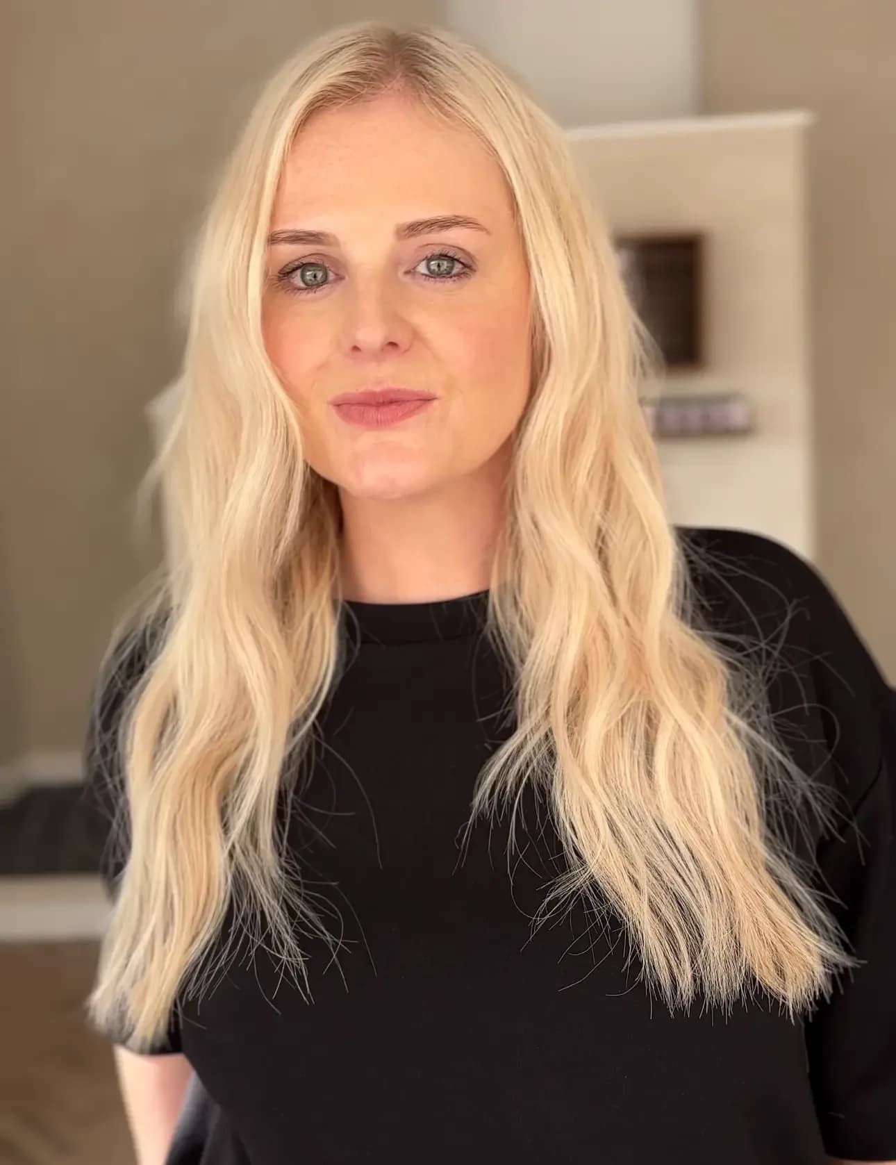 Happy thin hair client Emma showing discreet micro ring extensions